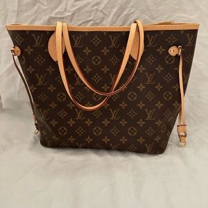 Like new Louis Vuitton Neverfull MM Fuchsia